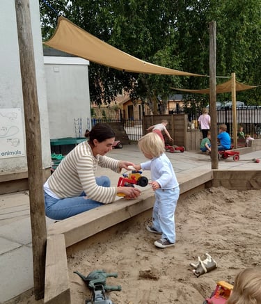 stay and play in the sand pit with members and their children