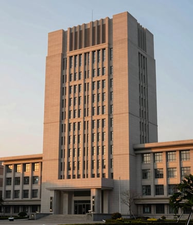 A high-quality, professional photograph of a modern university building in Taiwan during sunset. The lighting is warm and golden, reflecting the #B3A38C brand color. The style is clean and architectural, symbolizing academic growth and life in Taiwan.