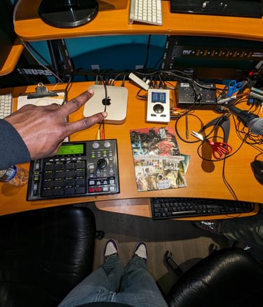 hazema by his studio desk with a keyboard and mouse
