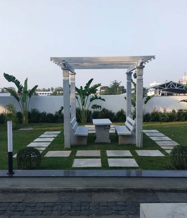 Pathway designed with natural stone slabs and edging by Garden Designers