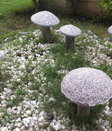 Ornamental boulders and retaining walls in landscape stonework by Garden Designers