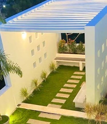 Modern terrace garden with seating and raised planters by Garden Designers