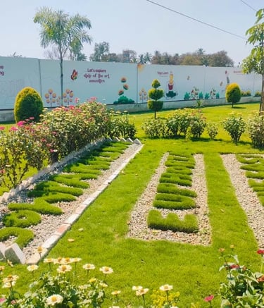 Luxury villa garden with ornamental features and tropical planting by Garden Designers