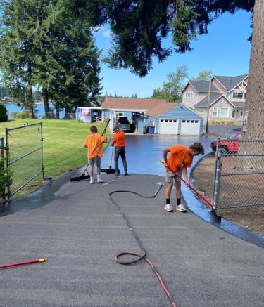 Residential sealcoating driveway in Olympia WA by THE LINE CO.
