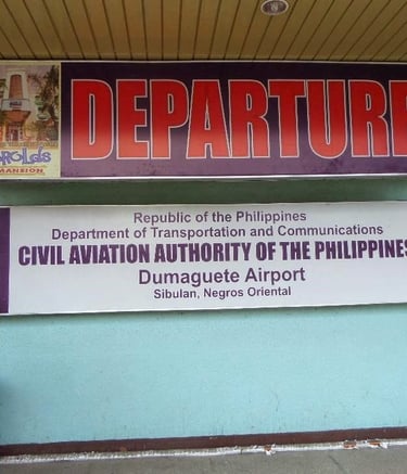 Departure entrance sign at Dumaguete Airport in Sibulan, Negros Oriental, Philippines.