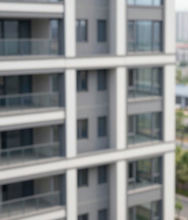 A high-angle architectural shot of a modern residential building facade with clean lines and large windows, reflecting a professional and organized atmosphere. The image features soft natural lighting and incorporates subtle tones of #5B7C85 and #AABCBF.