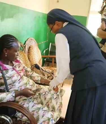 A catholic nun nurse providing medical care to a patient at a community health clinic in Africa.