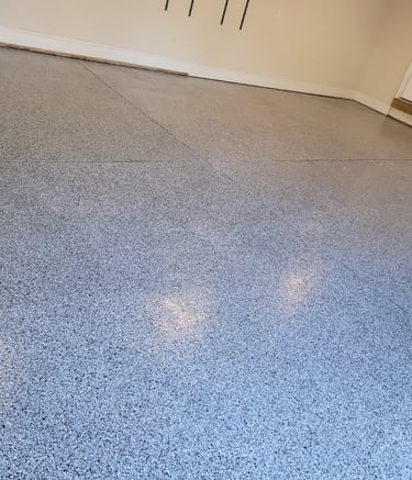 a garage floor with a garage flooring system