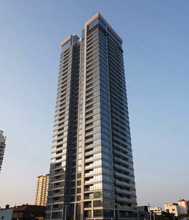 A wide-angle shot of a luxurious, modern residential high-rise building in a bustling Indian city during the golden hour. The architecture is sleek with glass balconies, reflecting a clear blue sky. The atmosphere is sophisticated and clean.