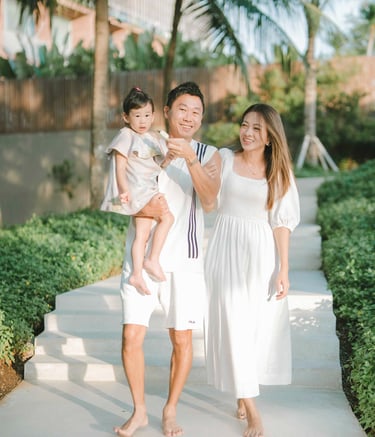 natural family portrait at W Bali Seminyak garden pathway