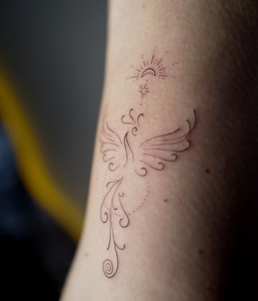 fineline tattoo brazo fenix cusco peru