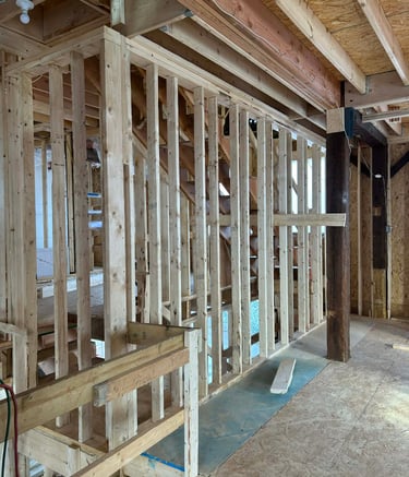 a room with a staircase and a staircase