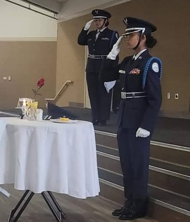 JROTC cadets at POW-MIA ceremony table