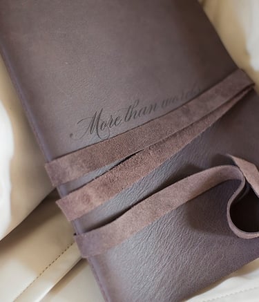 a leather bound notebook with a leather cover