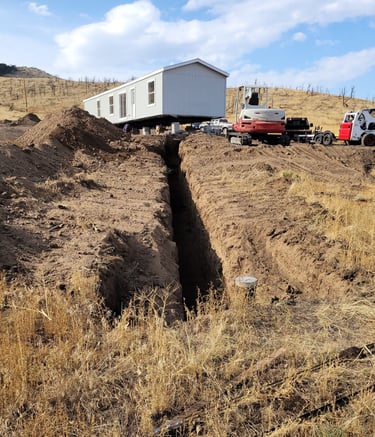 Installing a water line in the mountains of Larimer County Colorado