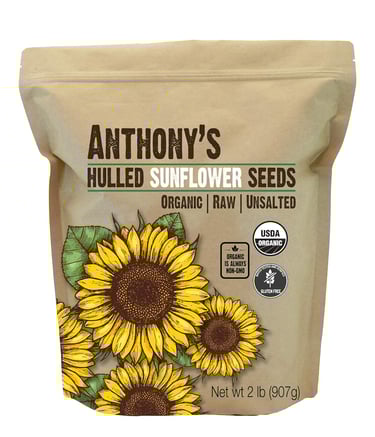 a bag of sunflower seeds on a white background