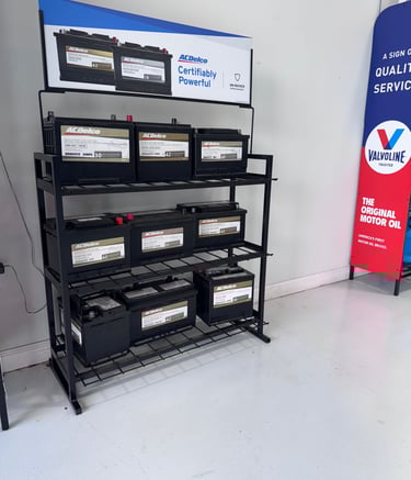 a display of batteries and batteries in a store