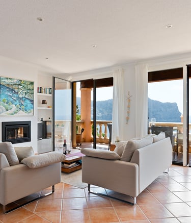 a living room with a fireplace and a fireplace