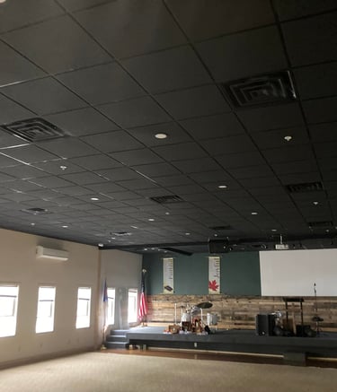 a church with a stage and a stage