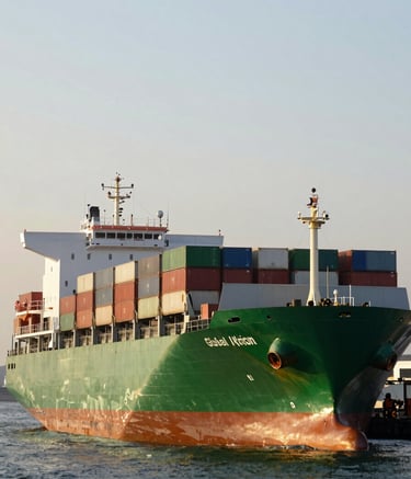 Wide-angle photography of a large cargo ship at a modern industrial port during golden hour. The scene emphasizes global logistics and supply chain strength with Forest Green and Mist White highlights in a Global / International environment.