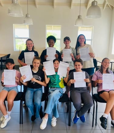 Students with their drama certificates
