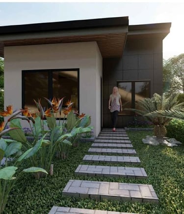 Diseño de casa pequeña moderna con techo plano, sendero de piedra y exuberante paisajismo tropical.
