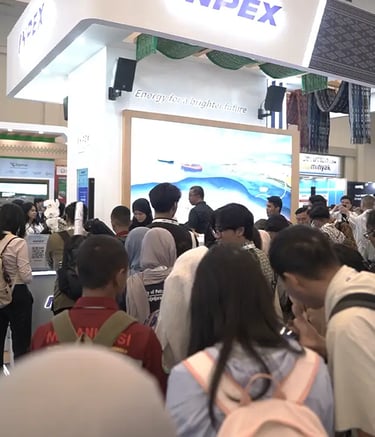 INPEX booth visitors exploring the interactive zones