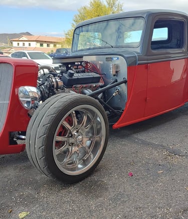 A Custom-built hot rod truck with an updated engine and powertrain.