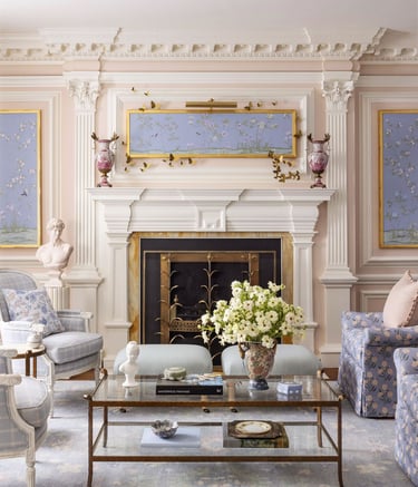 a living room with a fireplace and a fireplace