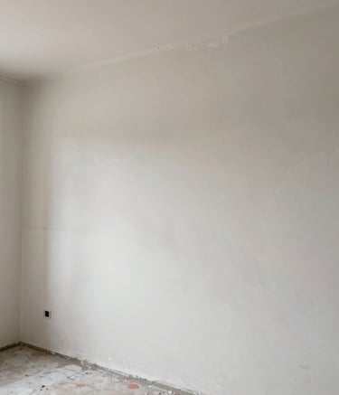 Wide shot of a residential sidewalk replacement project in progress on a sunny day.