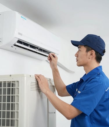 A professional technician in a clean blue uniform inspecting a modern air conditioning unit. The setting is a bright, modern interior. The lighting is crisp and clean, reflecting a trustworthy and efficient service atmosphere, incorporating brand tones of #1A2C3D and #4F6D7A.