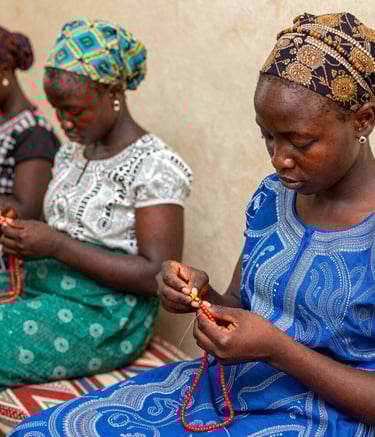 A gallery space illuminated softly, showcasing paintings that blend tradition with modernity.