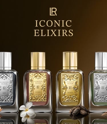 Luxury Iconic Elixirs perfume collection featuring gold and silver glass bottles for men and women.