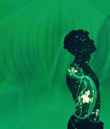 Double exposure silhouette of a man with glowing jellyfish on a vivid green background.