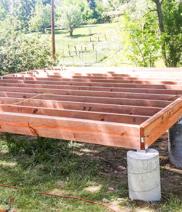 Custom shed floor joists and foundation piers built by Brewer Construction in Denver, Colorado.