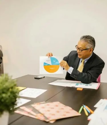 Business team discussing market entry strategy and growth planning in a corporate meeting