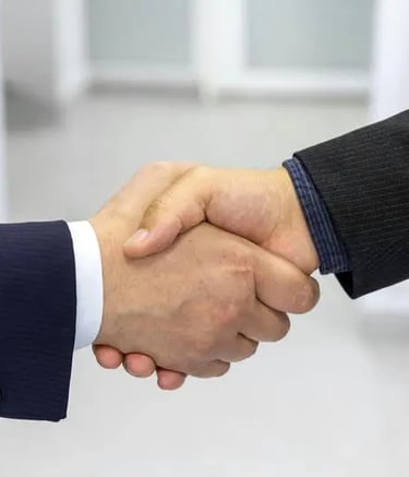 Handshake between professionals symbolizing trust, partnership, and business collaboration