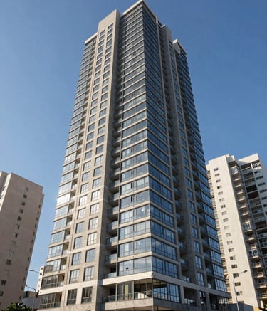 A wide-angle shot of a modern residential condominium building in a Brazilian metropolitan area, showcasing sleek glass and concrete architecture under a clear blue sky, emphasizing security and modern living.
