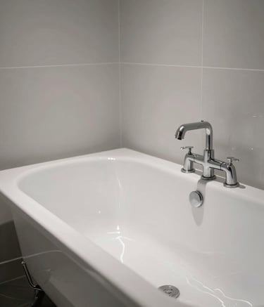 Wide shot of a clean, minimalist New York bathroom with industrial accents, soft light hitting a newly reglazed brilliant white porcelain tub, reflecting a premium professional finish, professional photography.