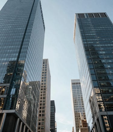 A low-angle shot of modern glass skyscrapers in a bustling North American city center under a clear sky, representing corporate strength and transparency. The lighting is crisp and natural, with a professional and contemporary mood.