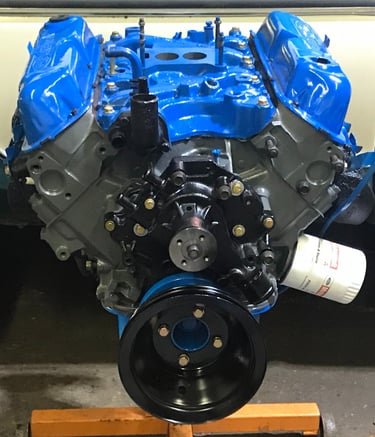 Fully Rebuilt engine with Blue and gray protective paint.