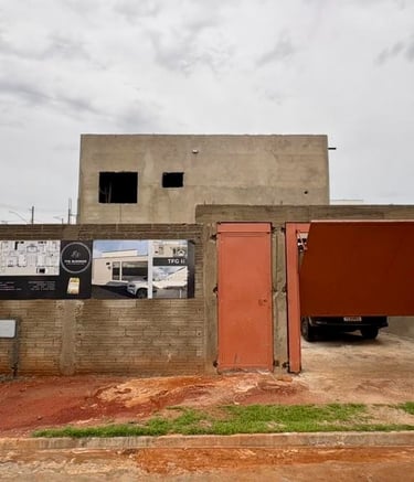a building with a red door and a sign that says,'do not enter