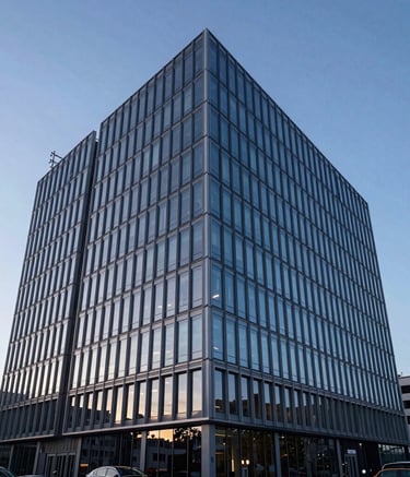 Wide shot of a contemporary glass and steel architectural corporate building in Central European city, dusk lighting with sky blue reflections on the facade, clean aesthetic reflecting stability and progress.