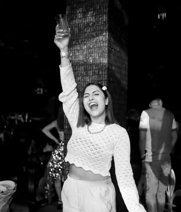 a woman in a white sweater and pants with a white sweater