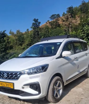 kumaoni tour & travels Ertiga taxi
