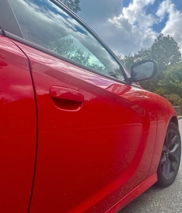 Red Dodge Charger lock representing auto locksmith in Arden, NC including lockout, key duplication, & ignition repair