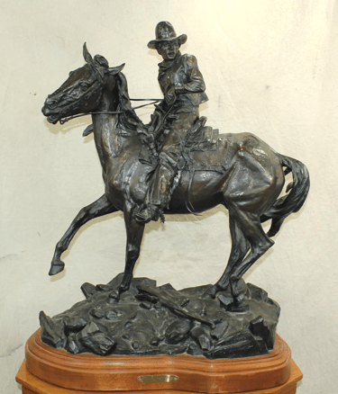 Large, Western bronze by artist Ken Payne.