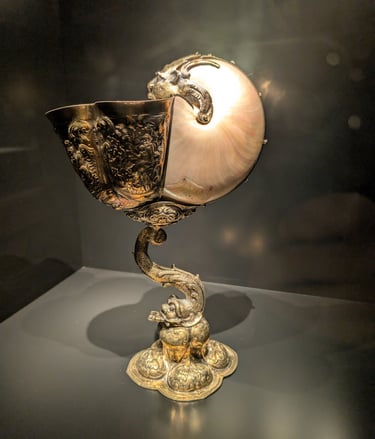 a nautilus shell chalice in with intricate gold work housed in the Hungarian National Museum