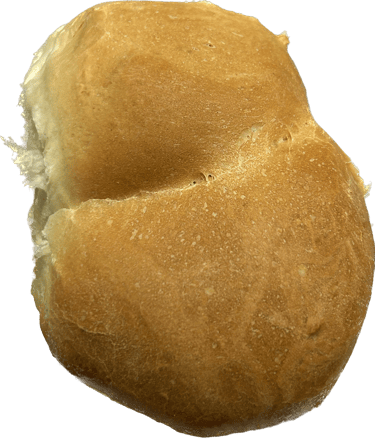 a loafed bread roll with a roll of bread