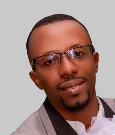 a man in a suit and glasses with a white shirt